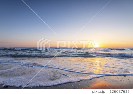 Sunrise at the beach. Sunrise at the beach. 126087635