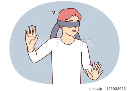 Frightened teen boy blindfolded trying to grope road of action in blind Frightened teen boy blindfolded trying to grope road of action in blind 126088638