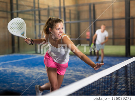 Woman with passion plays padel Woman with passion plays padel 126089272