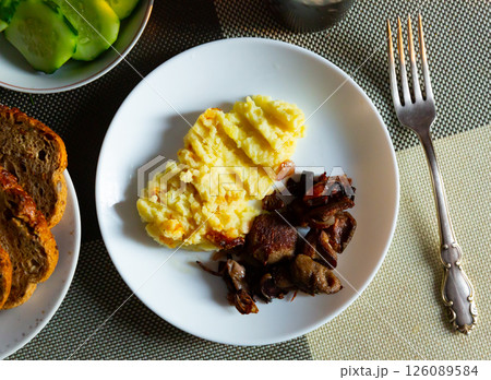 Mushrooms with mashed potatoes on white plate Mushrooms with mashed potatoes on white plate 126089584