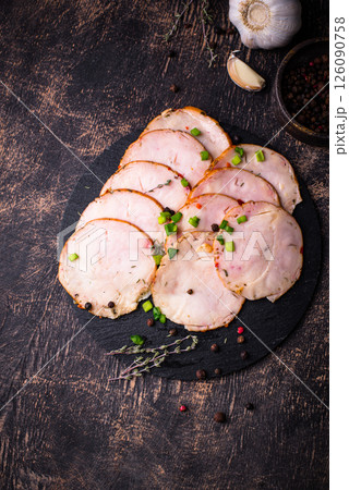 Sliced chicken sausage with herbs Sliced chicken sausage with herbs 126090758