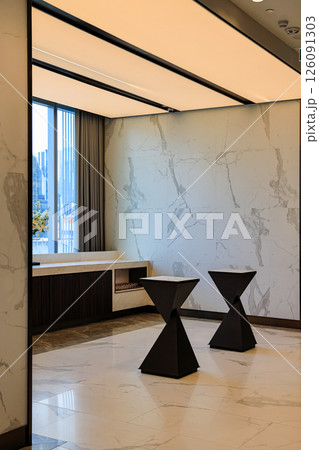 The beautiful and modern corridor or hallway of modern building. Mystical interior of empty corridor. 126091303