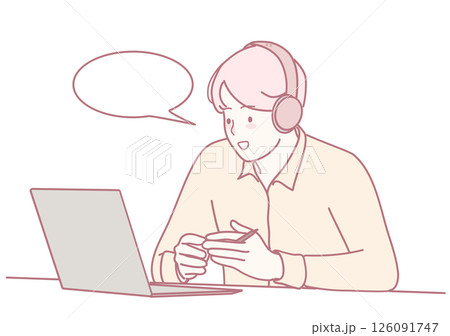 A person actively engaged in online communication using headphones while working remotely 126091747