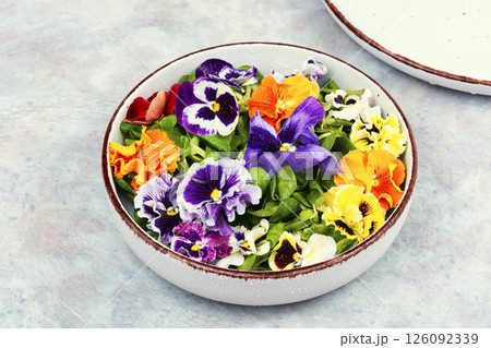 Mixed salad with edible flowers. Mixed salad with edible flowers. 126092339
