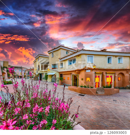Unbelivable view of Porto Cervo town illuminated at sunset. 126093003