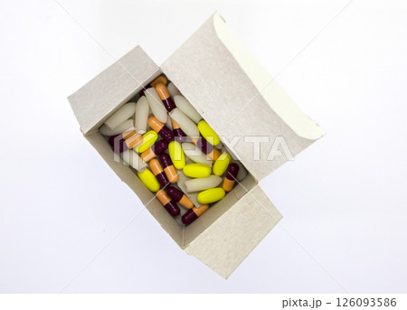 Medical pills in a cardboard box package. 126093586