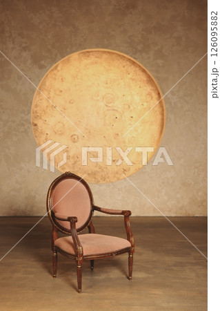 An Elegant Vintage Chair and Round Table Set in a Cozy and Inviting Home Environment An Elegant Vintage Chair and Round Table Set in a Cozy and Inviting Home Environment 126095882