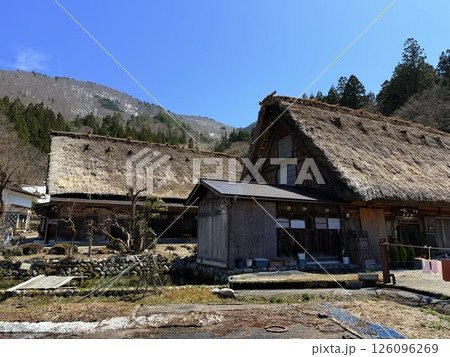 Shirakawa-go is historic village in Gifu Prefecture, famous for its gassho-zukuri farmhouses with steep thatched roofs, a UNESCO World Heritage Site. Shirakawa-go is historic village in Gifu Prefecture, famous for its gassho-zukuri farmhouses with steep thatched roofs, a UNESCO World Heritage Site. 126096269