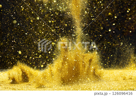 Photo of golden glitter powder sand creating abstract bokeh festive atmosphere. Bokeh of particle element of gold glitter sand light up luxury  background, sparkle glow wallpaper 126096416