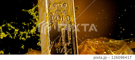 Melting Gold Bar Flowing into Liquid spray wealth prosperity. Gold bar standard is bank reserve to finance economic, golden liquid water splash as price up down. Black background isolated Melting Gold Bar Flowing into Liquid spray wealth prosperity. Gold bar standard is bank reserve to finance economic, golden liquid water splash as price up down. Black background isolated 126096417