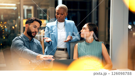 Creative, people and meeting with laptop at night for planning, story ideas and project deadline. Man, explain and brainstorming with team, research and article schedule for publication for overtime 126098788