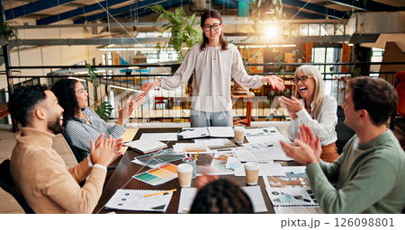 Creative paperwork, team and applause in meeting for campaign performance, good news and project success. Design agency, above and people with clapping hands for marketing pitch approval and feedback 126098801