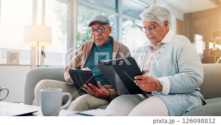 Senior couple, tablet and clipboard at house for finance planning, review bills and payment checklist. Elderly people, digital and document for investment, insurance application and asset management Senior couple, tablet and clipboard at house for finance planning, review bills and payment checklist. Elderly people, digital and document for investment, insurance application and asset management 126098812