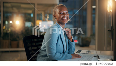 Portrait, black woman and business at night with computer for accounting, audit or tax review. African person, accountant or employee smile for financial solution, evaluation report or compliance 126099508