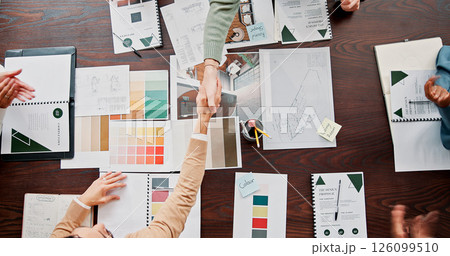 Creative, applause and shaking hands with partnership in office for renovation offer, deal and contract. Above, documents and people with handshake for interior designer approval and design agreement Creative, applause and shaking hands with partnership in office for renovation offer, deal and contract. Above, documents and people with handshake for interior designer approval and design agreement 126099510