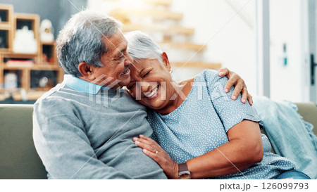 Smile, hug and senior couple in home, relax and commitment for relationship, bonding and love in lounge. House, old man and care for woman in living room, embrace and retirement for elderly people 126099793