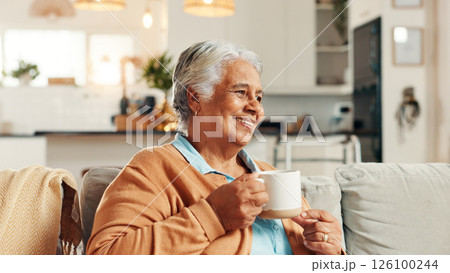 Elderly woman, thinking and smile with tea for relax, nostalgia and happy memories in home. Senior person, peace and warm drink on living room sofa with reflection, wellness and comfort in retirement Elderly woman, thinking and smile with tea for relax, nostalgia and happy memories in home. Senior person, peace and warm drink on living room sofa with reflection, wellness and comfort in retirement 126100244