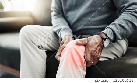 Hands, knee pain and old man on couch with glow, retirement and health issue with muscle tension at home. Fibromyalgia, arthritis or brittle bones with legs, inflammation and pressure overlay closeup 126100513