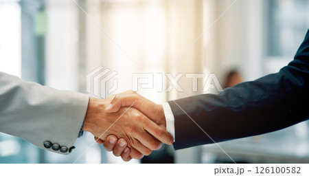 Handshake, agreement and business men in office with partnership, contract or merger. Meeting, thank you and finance manager shaking hands with investor for investment opportunity or negotiation. Handshake, agreement and business men in office with partnership, contract or merger. Meeting, thank you and finance manager shaking hands with investor for investment opportunity or negotiation. 126100582