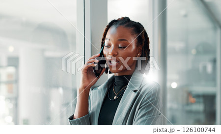 Black woman, office and window with phone call for business discussion, proposal or negotiation. Female person, lawyer or attorney talking with mobile smartphone for conversation or chat at workplace Black woman, office and window with phone call for business discussion, proposal or negotiation. Female person, lawyer or attorney talking with mobile smartphone for conversation or chat at workplace 126100744