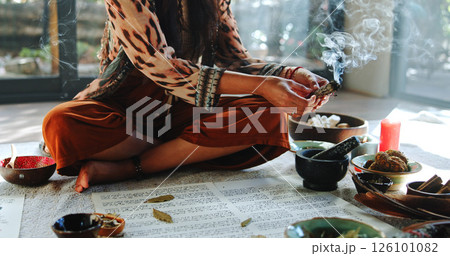 Healing, smoke and holistic with hands of woman for spiritual retreat, self care ritual and burning herbs. Naturopath, mindfulness and smudge ceremony with closeup of person for aura cleanse Healing, smoke and holistic with hands of woman for spiritual retreat, self care ritual and burning herbs. Naturopath, mindfulness and smudge ceremony with closeup of person for aura cleanse 126101082