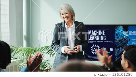 Applause, presentation and woman with smile, boardroom and training for machine learning and happy. Achievement, colleagues and people with successful meeting, clapping and excited for ai in business Applause, presentation and woman with smile, boardroom and training for machine learning and happy. Achievement, colleagues and people with successful meeting, clapping and excited for ai in business 126101286