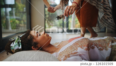 Spiritual, healing and woman with shaman, hands and smudging for cleansing, traditional and inner peace. Holistic, sage and smoke for awakening of person, chakra and ritual to remove negative energy Spiritual, healing and woman with shaman, hands and smudging for cleansing, traditional and inner peace. Holistic, sage and smoke for awakening of person, chakra and ritual to remove negative energy 126101509