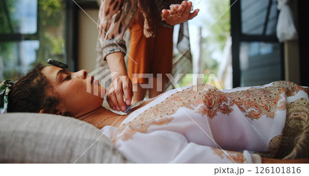 Ritual, inner peace and woman with healer, hands and meditation for self awareness, spiritual and smoke. Ceremony, chakra and holistic for soul with gemstone, zen and awakening of person with shaman 126101816
