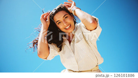 Fashion, portrait and woman with smile, outdoor and stylist with confidence for career, sky and clothes. Blue background, employee and person with happiness for outfit, mockup and low angle in Canada 126101886