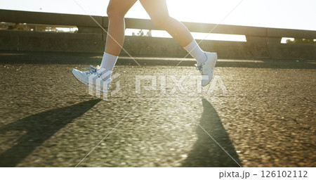 Bridge, fitness and legs of athlete running in city for race, marathon or training for speed. Sports, outdoor and feet of person on highway with cardio workout, challenge or exercise in town. 126102112