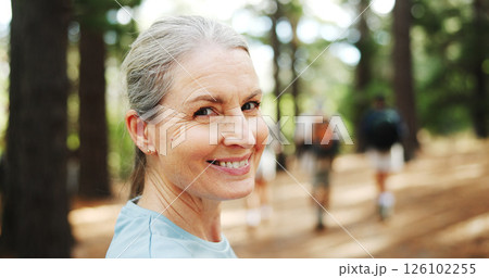 Hiking, nature and portrait of mature woman with smile for exercise, workout and walking for wellness. Fitness, travel and person in forest and woods for trekking, adventure and journey outdoor Hiking, nature and portrait of mature woman with smile for exercise, workout and walking for wellness. Fitness, travel and person in forest and woods for trekking, adventure and journey outdoor 126102255