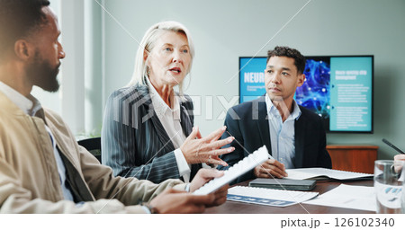 Meeting, business and people explaining in office for planning, neuroscience and innovation ideas. Manager, presentation and briefing with paperwork, brain technology and proposal with neurofeedback 126102340