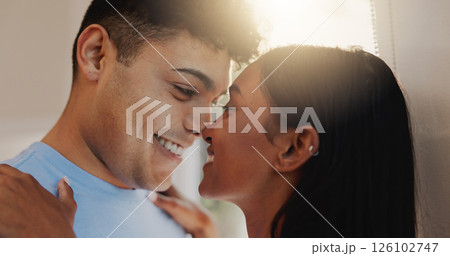 Love, romance and smile with couple in home together for morning affection, bonding or wake up. Safety, security or trust with happy man and woman in apartment for commitment, marriage or weekend 126102747