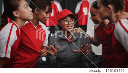 Women, coach and discussion with soccer team for motivation or collaboration in locker room. Female people, coordinator or talking with group or sport players in huddle for idea, game plan or match 126103362