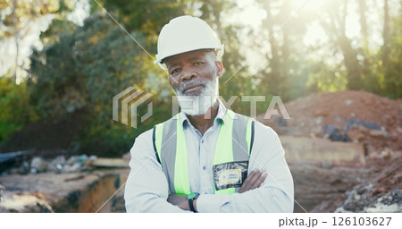 Serious, crossed arms and face of black man on site with confidence for repairs or building. Career, pride and portrait of African foreman with engineering project development for maintenance. 126103627