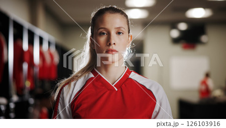 Locker room, girl or soccer player in portrait for sports, match competition or tournament. Serious, development or woman in changing area ready for football game, challenge or playing in contest Locker room, girl or soccer player in portrait for sports, match competition or tournament. Serious, development or woman in changing area ready for football game, challenge or playing in contest 126103916
