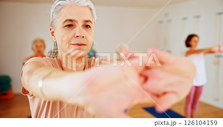 Senior woman, stretching and instructor in yoga class for fitness, exercise and community for wellness. Elderly person, teaching and pilates for spiritual healing, balance and group at health club Senior woman, stretching and instructor in yoga class for fitness, exercise and community for wellness. Elderly person, teaching and pilates for spiritual healing, balance and group at health club 126104159