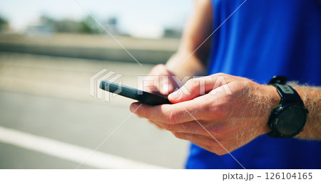 Runner, road or phone in hands with fitness for checking workout progress, tracking exercise or wellness. Person, closeup or athlete on mobile app in city for online running route, map and navigation Runner, road or phone in hands with fitness for checking workout progress, tracking exercise or wellness. Person, closeup or athlete on mobile app in city for online running route, map and navigation 126104165