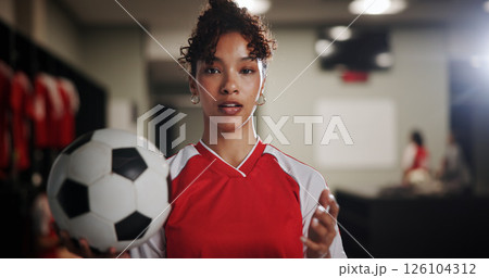 Locker room, woman and portrait with football player for sports, match competition and athlete. Changing area, professional and female person with pride for soccer, game and confident for playing 126104312