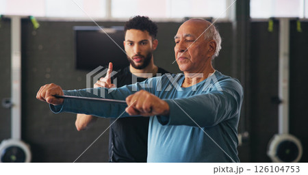Personal trainer, senior man and resistance band for exercise with workout, guide or support at gym. Coach, help and strong at class for training, stretching or fitness at wellness club in retirement 126104753