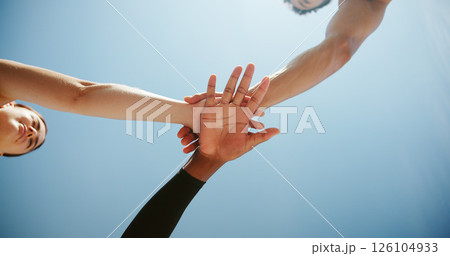 Fitness, people and hands together below with huddle for motivation, teamwork or unity under blue sky. Low angle, active group or friends piling with stack in solidarity for mission or coordination Fitness, people and hands together below with huddle for motivation, teamwork or unity under blue sky. Low angle, active group or friends piling with stack in solidarity for mission or coordination 126104933