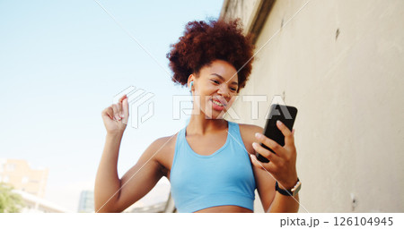 Fitness, dancing and girl on break in city for running, outdoor workout or training motivation. Playlist, earphones and happy runner with music for sports routine, exercise or wellness for health 126104945