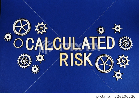 Calculted Risk alphabet letters with gears element on navy blue background 126106326