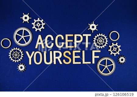 Accept Yourself alphabet letters with gears element on navy blue background Accept Yourself alphabet letters with gears element on navy blue background 126106519