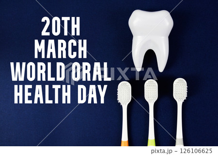 20th March World Oral Health Day text with tooth figure and toothbrushes on navy blue background 20th March World Oral Health Day text with tooth figure and toothbrushes on navy blue background 126106625