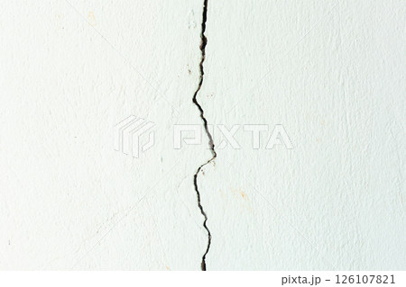 Crack or damage on concrete wall need repair. 126107821