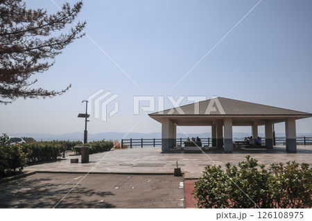 March 23 2025 Peaceful Pavilion Overlooking Scenic Landscape Under Clear 126108975