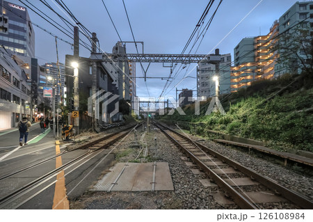 across railway tracks amidst an urban setting at dusk, Yoyogi Dec 7 2024 126108984