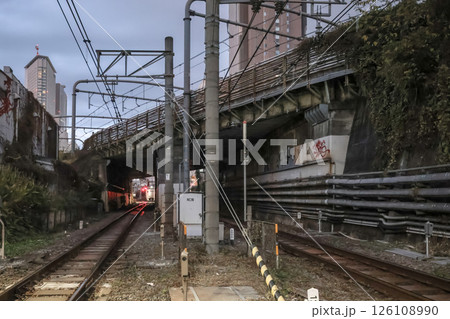 across railway tracks amidst an urban setting at dusk, Yoyogi Dec 7 2024 across railway tracks amidst an urban setting at dusk, Yoyogi Dec 7 2024 126108990