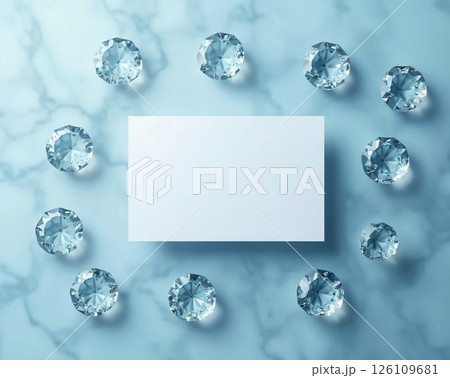 Elegant diamonds arranged around a blank card on a marble surface for creative design purposes Elegant diamonds arranged around a blank card on a marble surface for creative design purposes 126109681